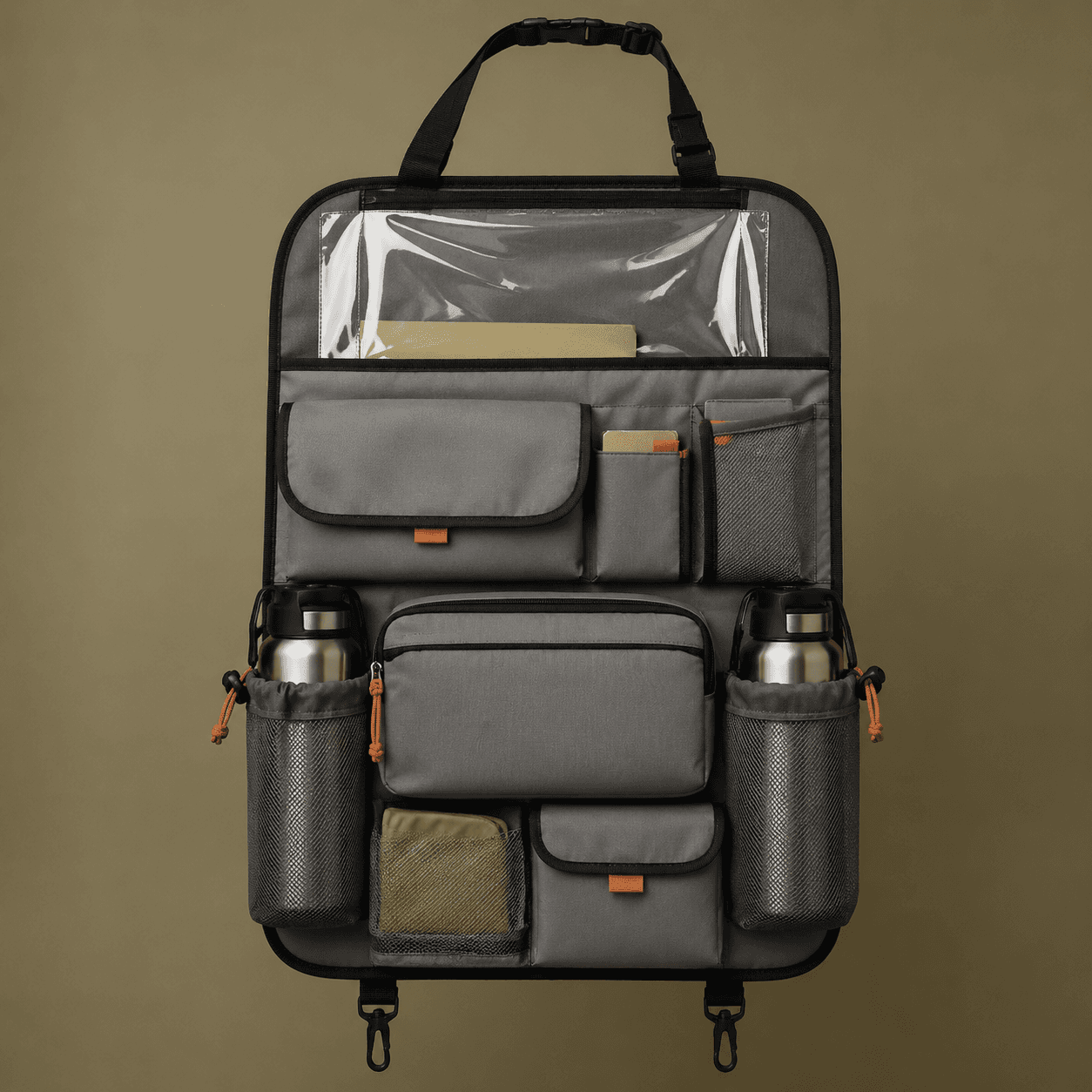 Grey seat-back pocket organizer with multiple sleeves, studio shot